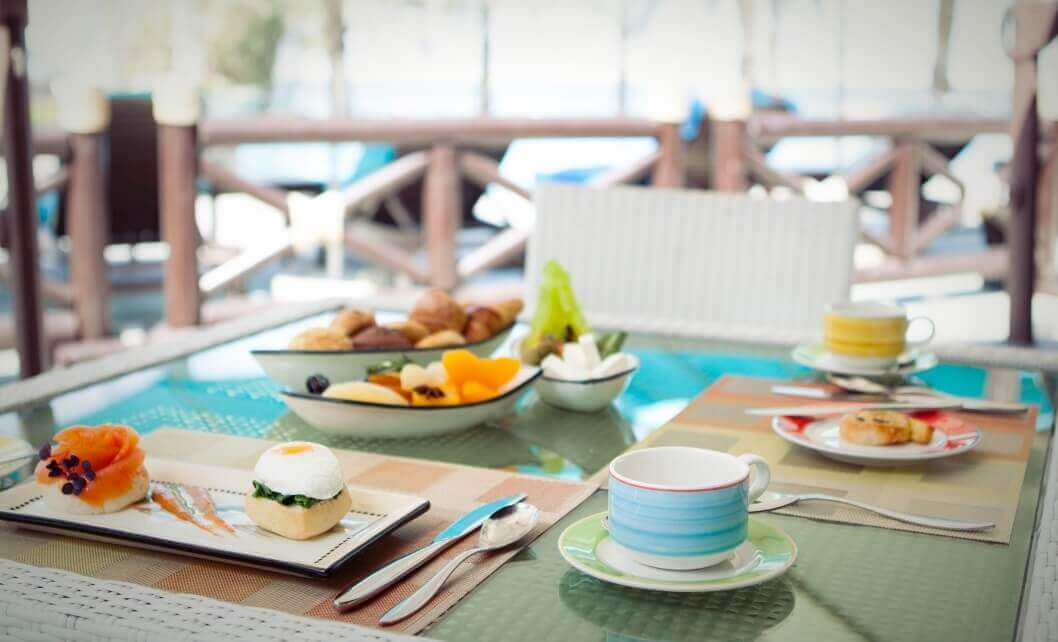Outdoor Table With Breakfast Dishes