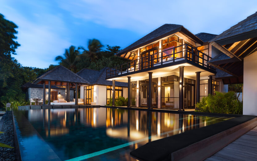 JA_Manafaru_Aerial_Accommodation_Beach Residence_2BR_Beach_2024_Night Shot.jpg