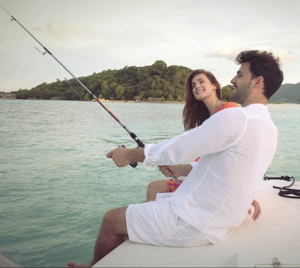 Couple Fishing on Boat