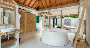 JA_Manafaru_Accommodation_Deluxe Beach Villa_Private Pool_Bathroom.jpg