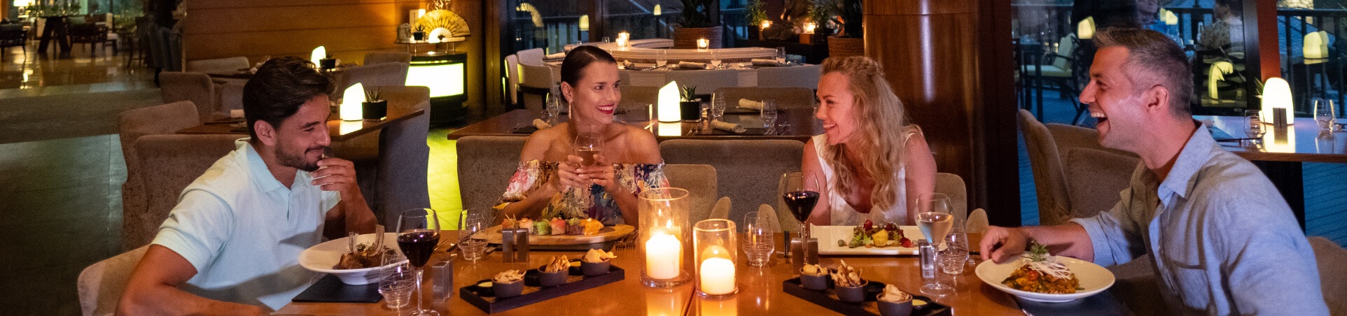 Couples Eating Dinner at Restaurant