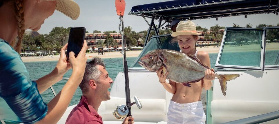 Girl Showing Off Fish