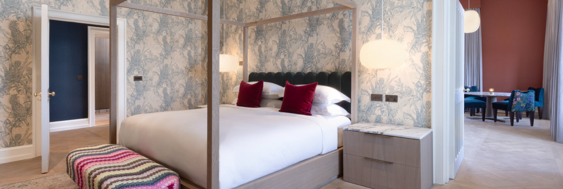 Interior of a guest room bedroom at JA Mar Hall