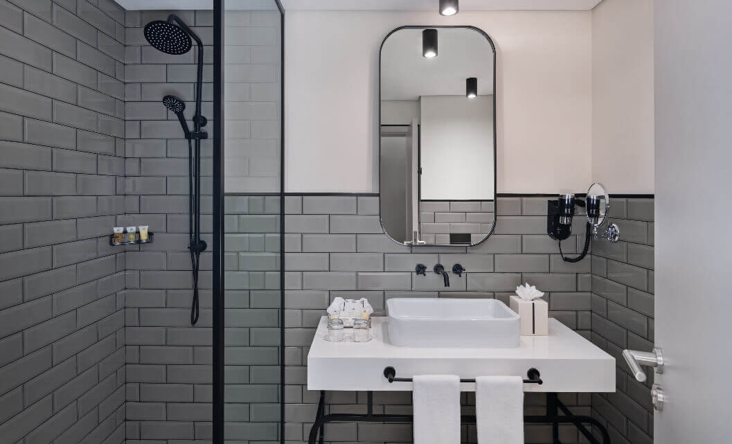 Grey Bathroom with Shower and Sink
